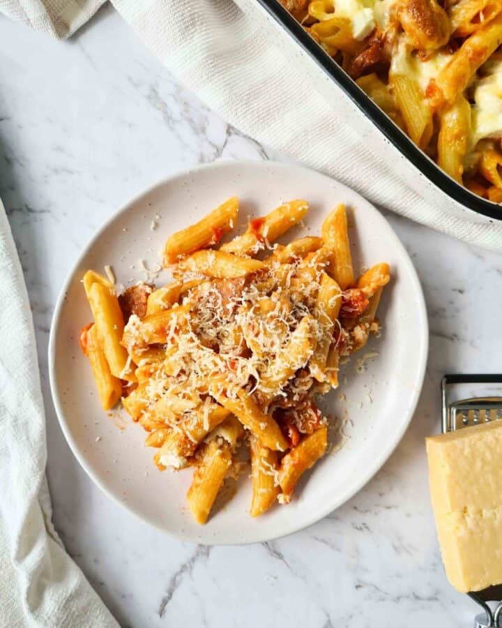 a serving of this dish topped with freshly grated parmesan cheese