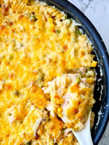 Golden baked tuna mornay with a spoon