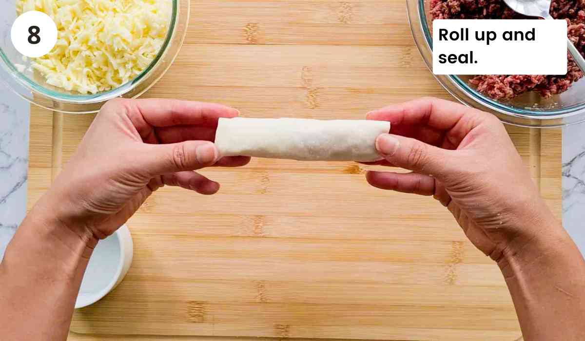 a rolled up pastry roll with caption
