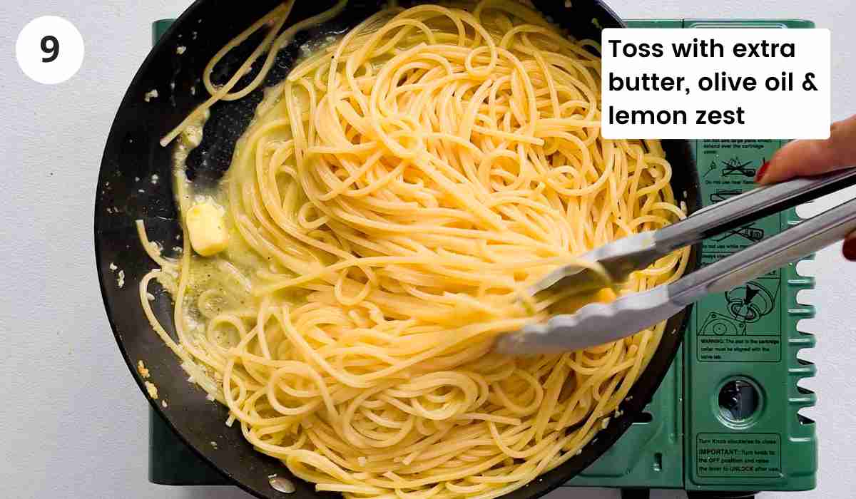 Spaghetti being tossed in garlic butter sauce with caption